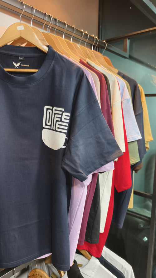 Plain oversized t-shirts in multiple colours on rack